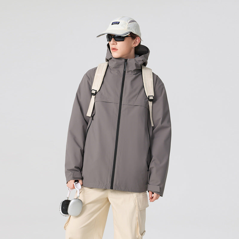 Herren Minimalistische Hybrid‑Regenjacke mit verstaubarer Kapuze und atmungsaktiver Membran Drune