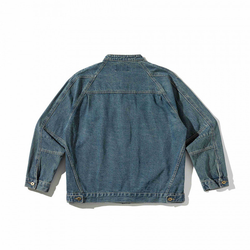 Unisex Boxige Denim‑Hemdjacke im Worker‑Look mit Stehkragen, Raglanärmeln und Brust‑Welttasche Drune