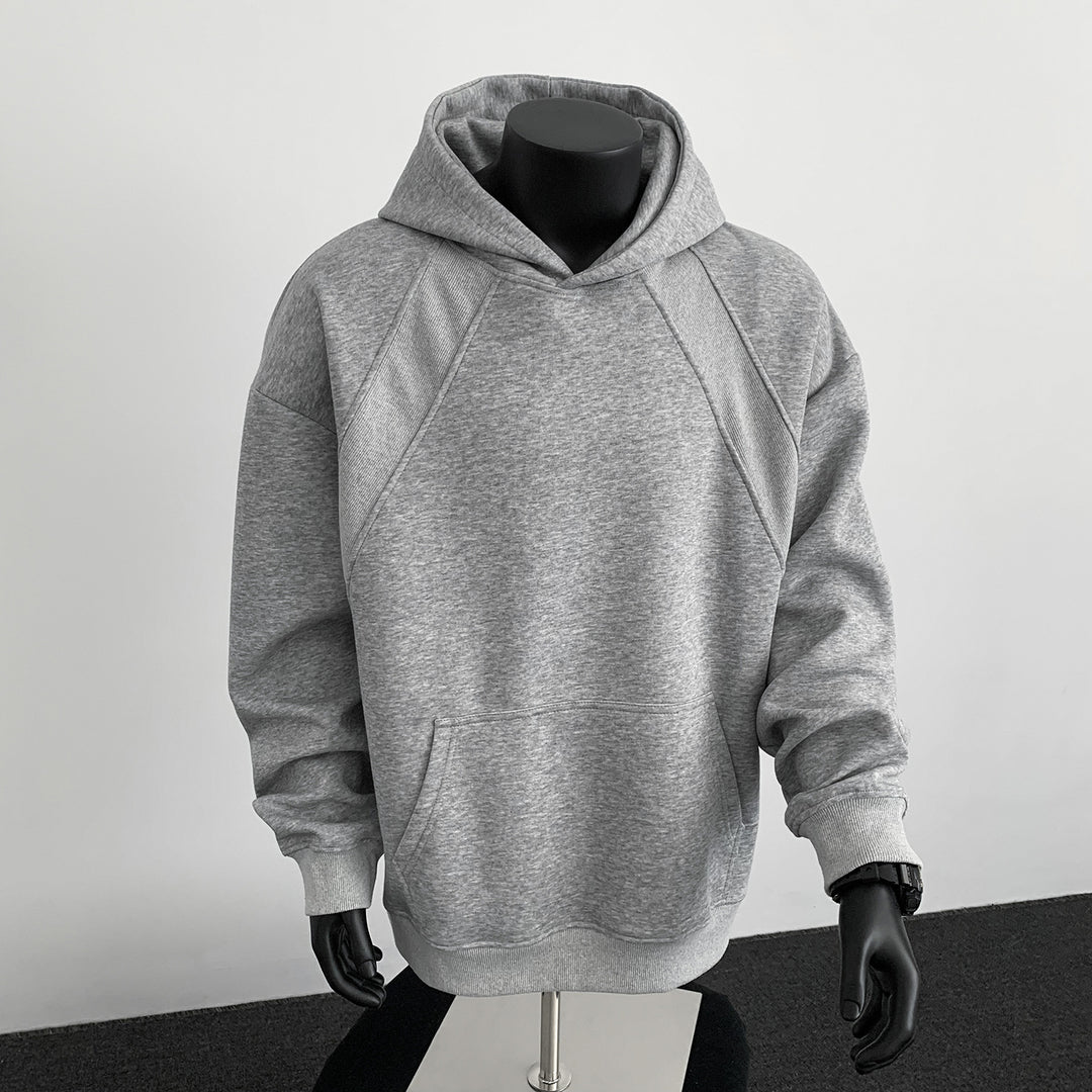 Herren Oversize-Kapuzenpullover mit diagonalem Einsatz und Kängurutasche Drune