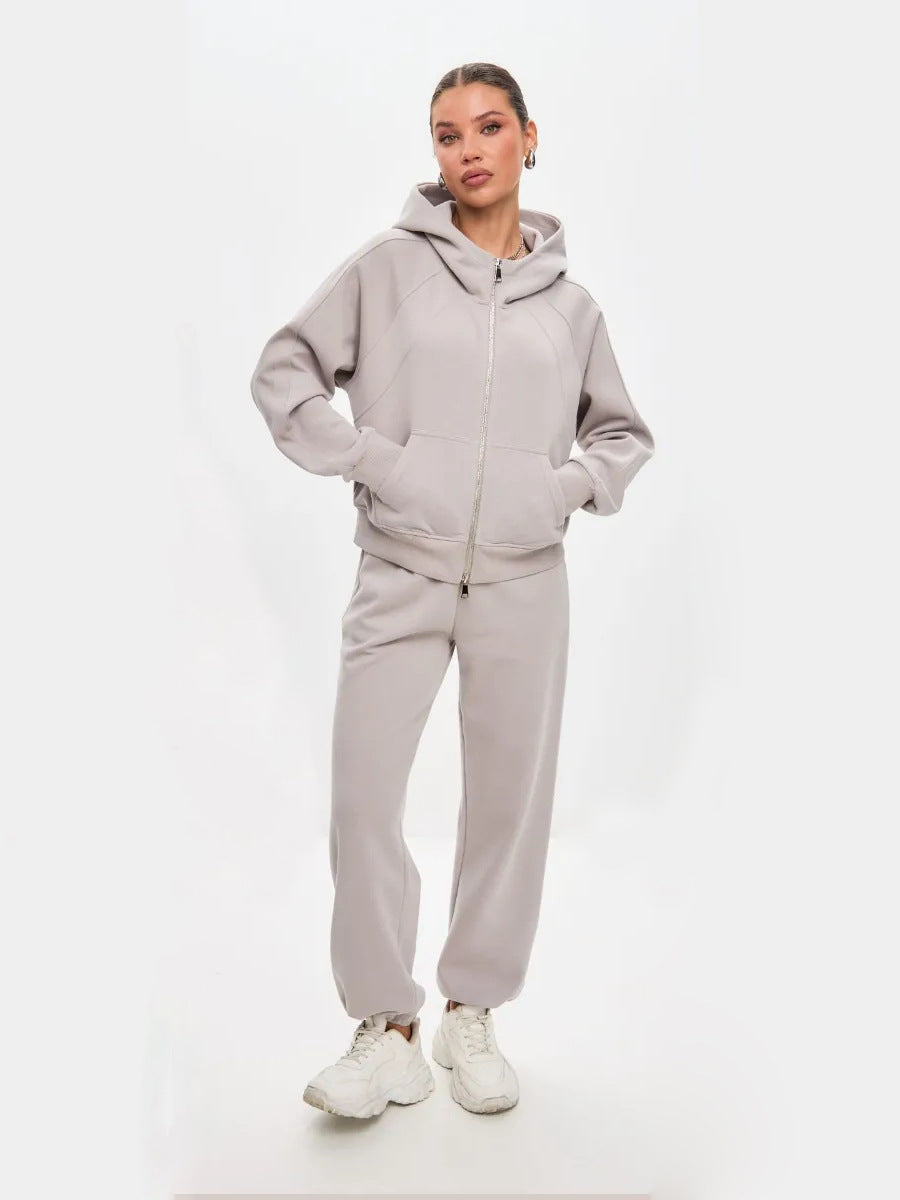 Damen entspanntes Fleece-Zweiteiler Set mit Raglan-Kapuzenjacke, durchgehendem Reißverschluss und gerader Relax-Jogginghose Drune