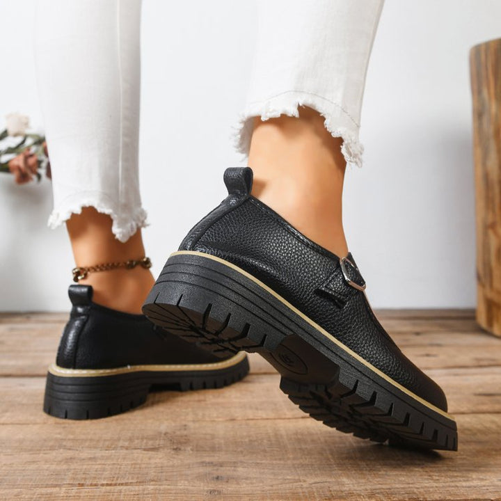 Damen Riemchen‑Slipper im Mary‑Jane‑Stil mit grober Profilsohle und Herzschließe Drune