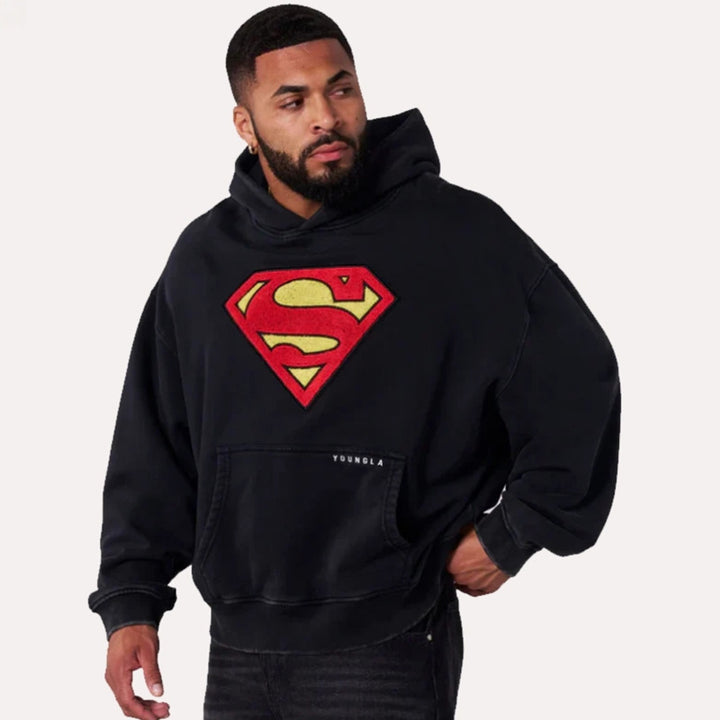 Herren nan weit geschnittener Kapuzenpullover mit markantem Comic‑S‑Logo Kängurutasche und gewaschener Look Drune