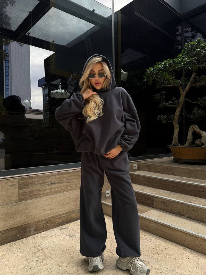Damen oversized Kapuzen-Sweatshirt mit Ballonärmeln und weite High-Waist Jogginghose Drune
