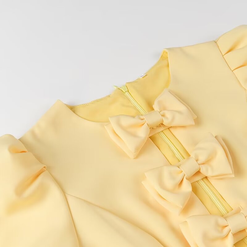 Damen Kleid mit verspielten Schleifen und modischem Puffärmel Drune