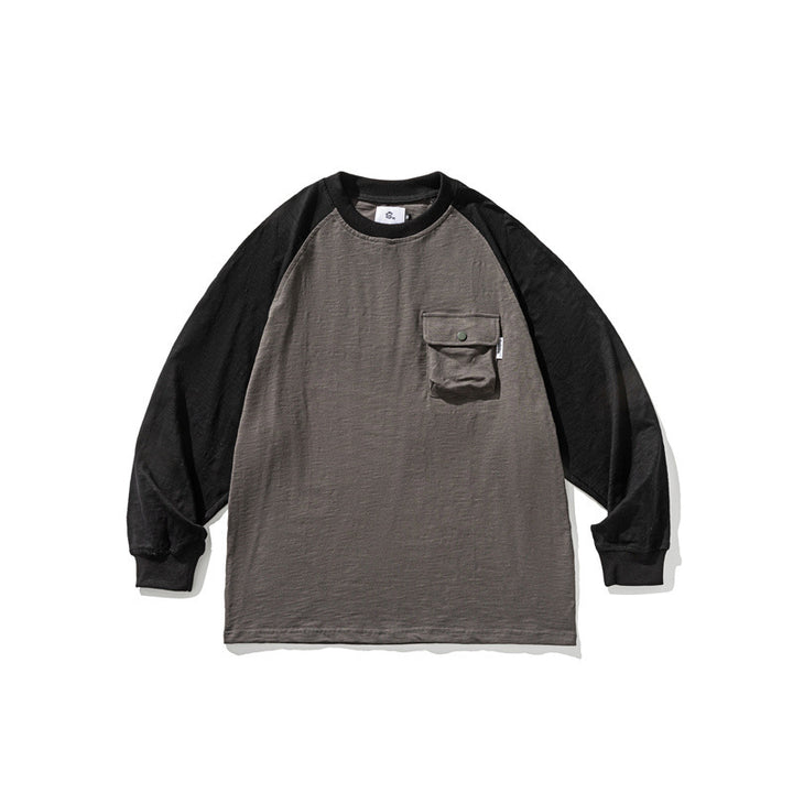 Unisex Lässiges Raglan-Longsleeve mit Kontrastärmeln und aufgesetzter Klappentasche Drune