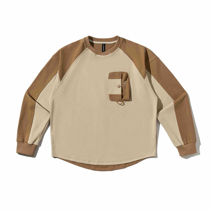 Unisex Raglan‑Sweatshirt mit halbrundem Saum und aufgesetzter Brusttasche Drune