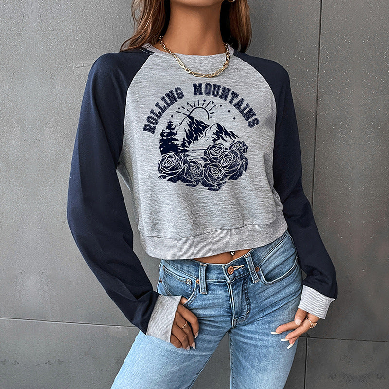Damen Cropped Raglan-Sweatshirt mit Bergmotiv, Rippbündchen und lockerer Passform Drune