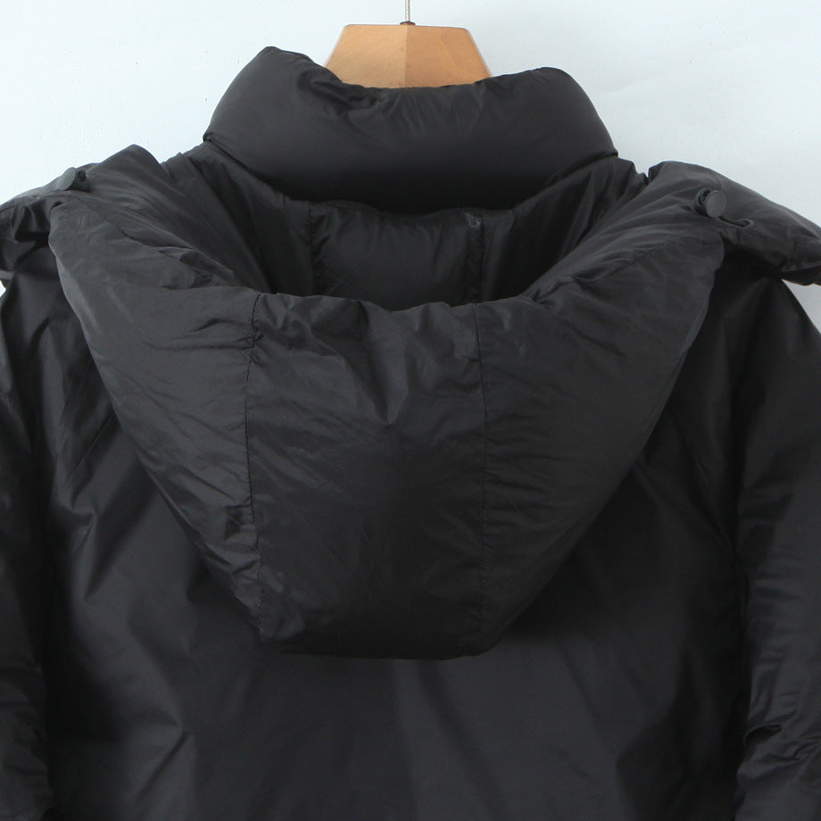 Damen Kurze boxy Funktionsjacke mit Kapuze, wattierter Isolierung und diagonalen Reißverschlusstaschen Drune