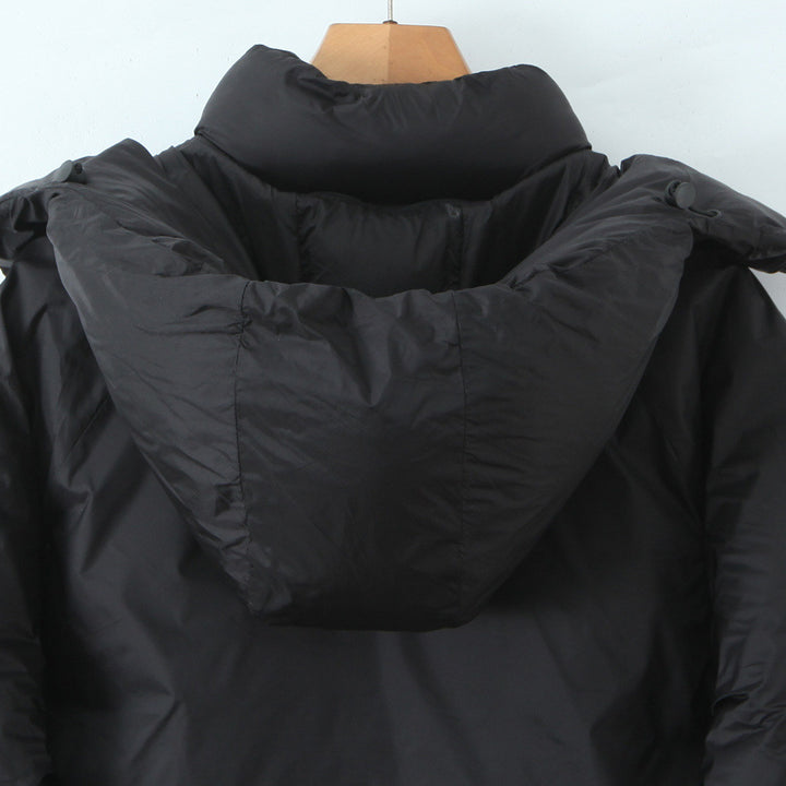 Damen Kurze boxy Funktionsjacke mit Kapuze, wattierter Isolierung und diagonalen Reißverschlusstaschen Drune