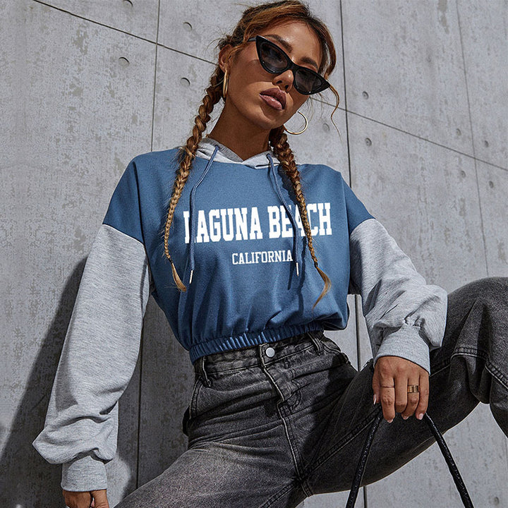 Damen Cropped Hoodie mit Kontrastärmeln, elastischem Saum und schmelzendem Smiley-Print Drune