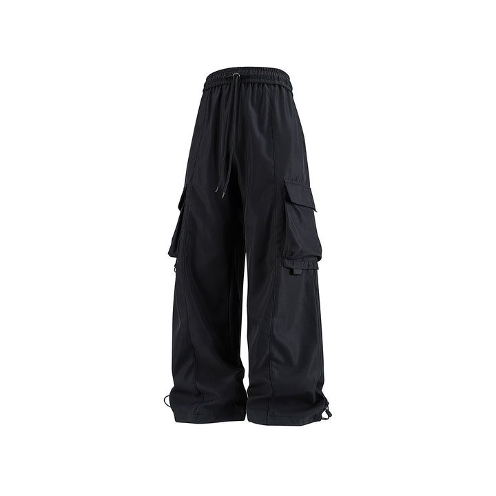 Herren weite Utility‑Cargohose im Baggy‑Cut mit Tunnelzugbund, großen Klappentaschen und verstellbarem Beinabschluss Drune