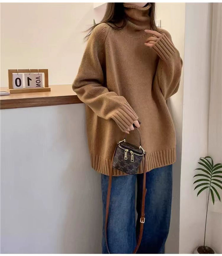 Damen Grobstrickpullover mit Stehkragen und seitlichen Schlitzen Drune
