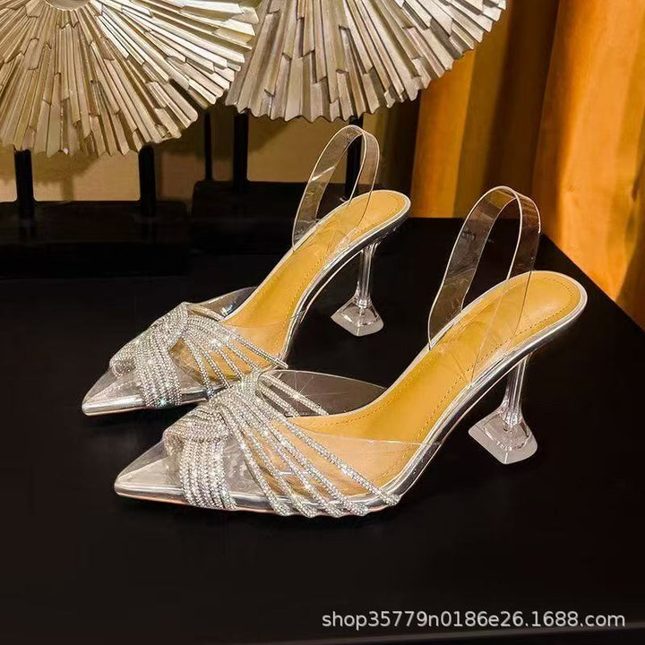 Damen spitz zulaufende Mule mit funkelnden Kristallriemen und skulpturellem Acrylabsatz Drune