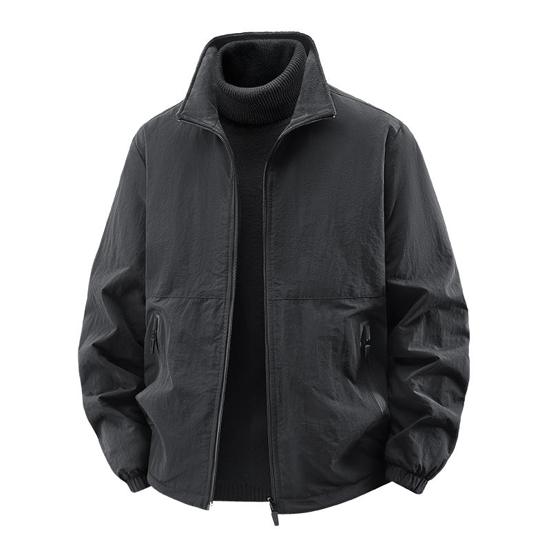 Men's  minimalist stand-collar travel jacket with sealed zip pockets and elastic cuffs Drune