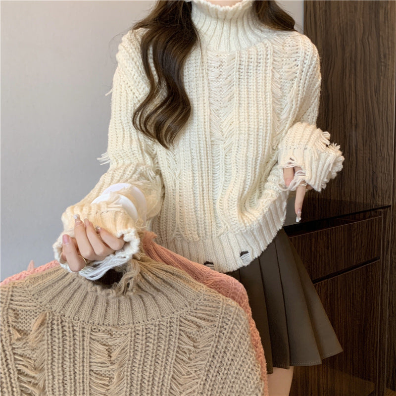 Damen Grobstrickpullover mit hohem Kragen und modernen Fransen Drune