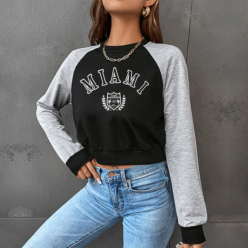 Damen Kurzgeschnittenes College-Cropped-Sweatshirt mit Raglanärmeln und elastischem Saum Drune