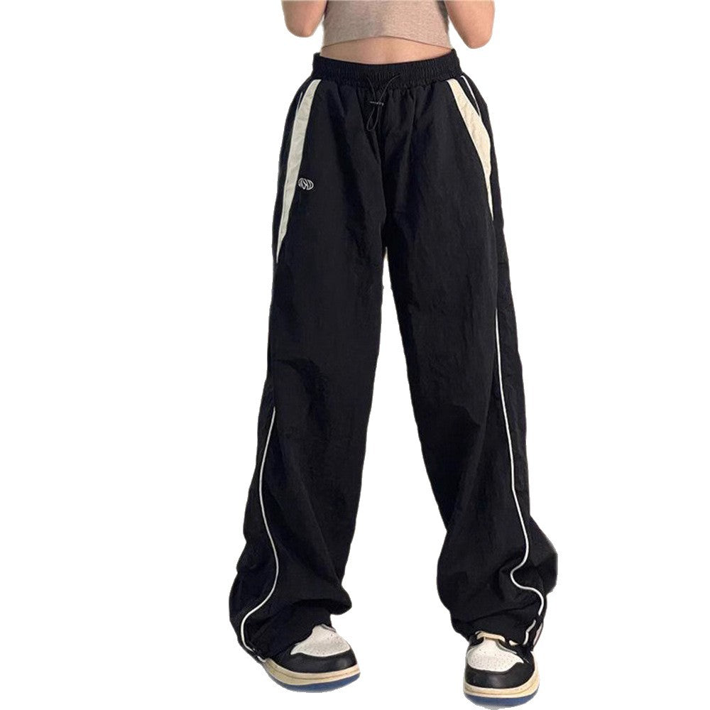Damen nan weite Trackhose mit Kontrastpaspel, elastischem Bund und Oversize-Schnitt Drune