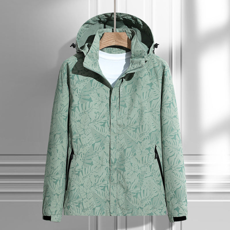 Damen leichte Packbare Regen- und Windjacke mit Kapuze, Blattmuster und verdeckten Reißverschlüssen Drune