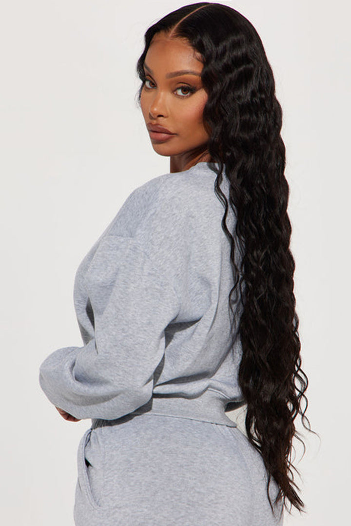 Damen cropped Sweatshirt mit überschnittenen Schultern und breitem Saum Drune
