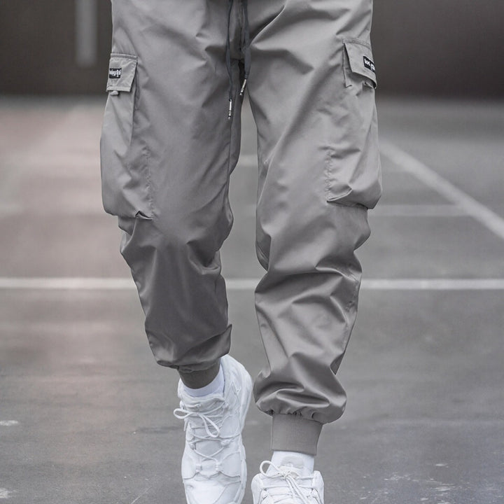 Herren Tapered Cargo-Joggerhose mit elastischem Tunnelzug, verstärkten Klappentaschen & gerippten Knöchelbündchen Drune