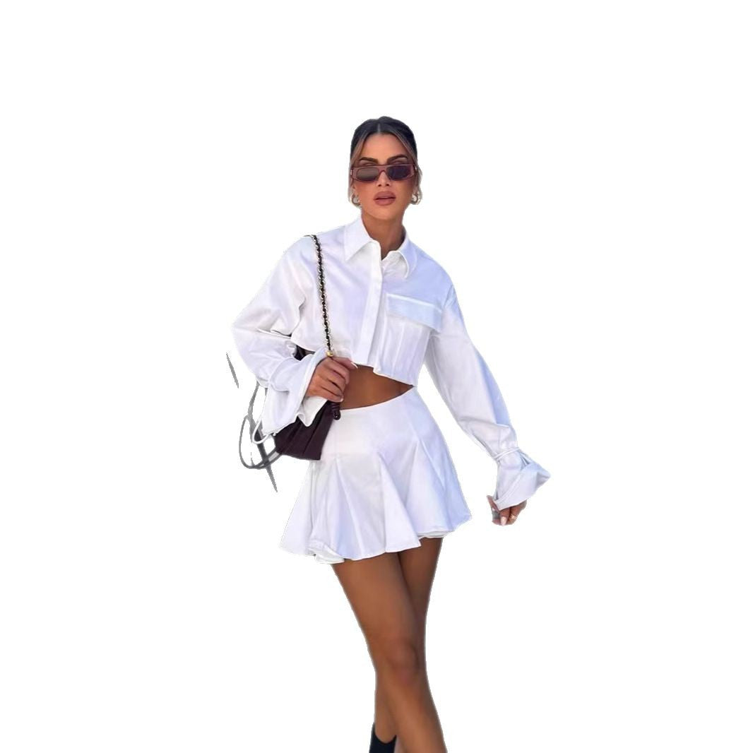 Damen modisches kurzämliges Set aus fließendem Material mit cropped Bluse und weit schwingendem Rock Drune