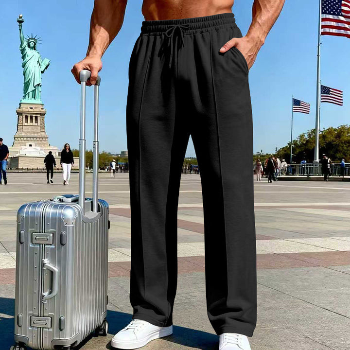 Herren Weite Travel-Loungehose mit Bügelfalte, elastischem Tunnelzug und seitlichen Eingrifftaschen Drune