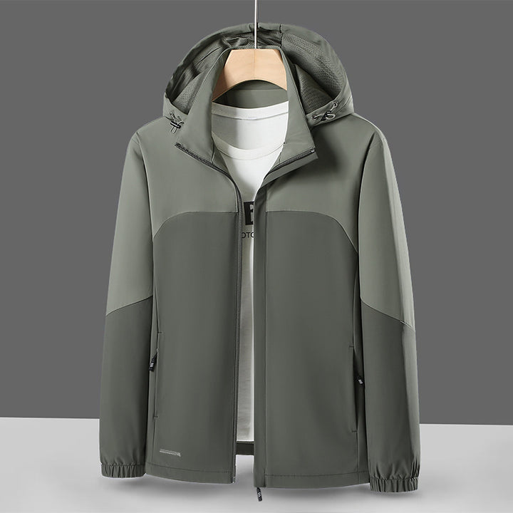 Herren Leichte Softshell-Windjacke mit Kapuze, wasserabweisender Membran und Reißverschlusstaschen Drune
