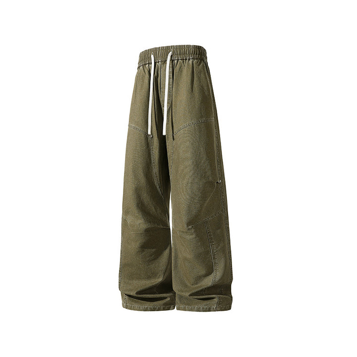 Herren weite Baggy-Cargohose aus gewaschenem Canvas mit Elastikbund und dekorativen Nahtpaneelen Drune