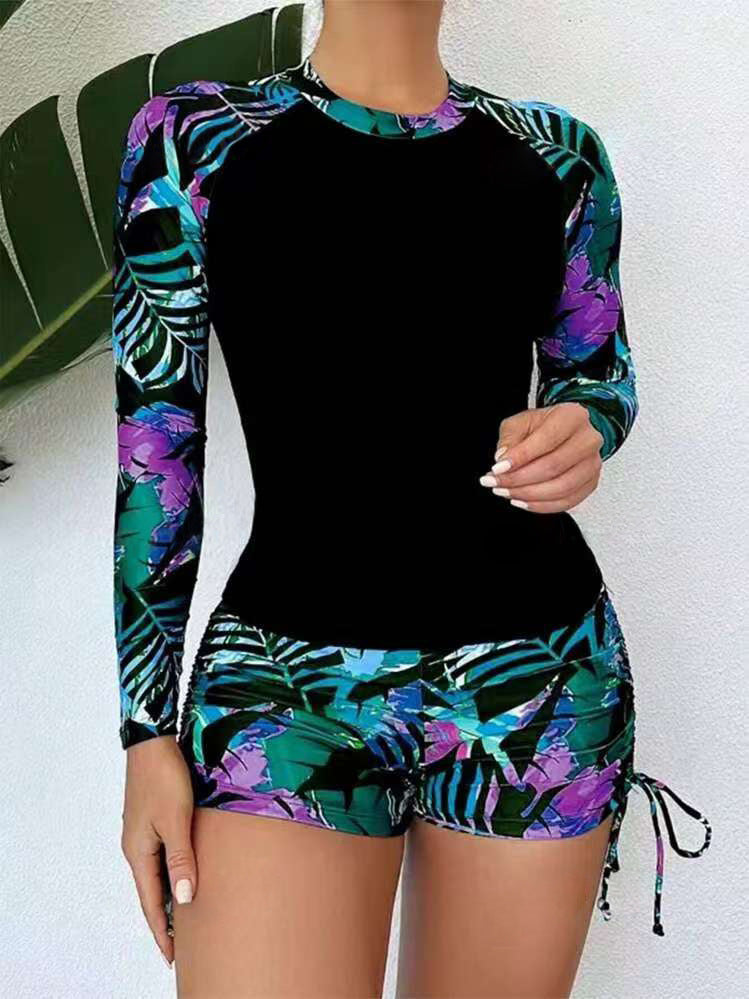 Damen Sport-Rashguard mit kurzen Hosen und farbenfrohem Muster Drune