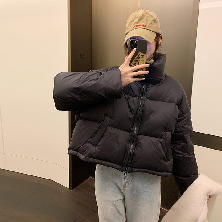 Damen Kurz geschnittene Pufferjacke mit hohem Kragen und seitlichen Taschen Drune