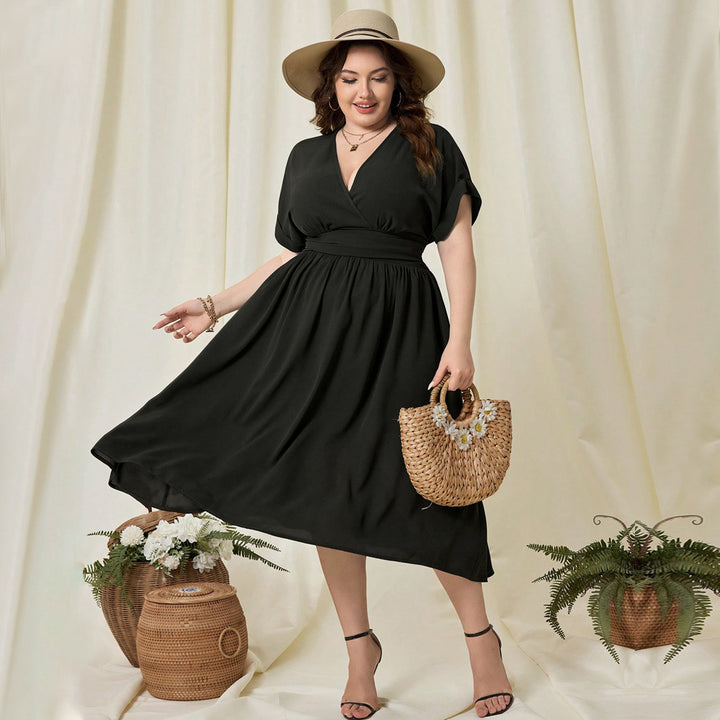 Damen Maxikleid mit elegantem Wickeldesign und fließendem Saum Drune