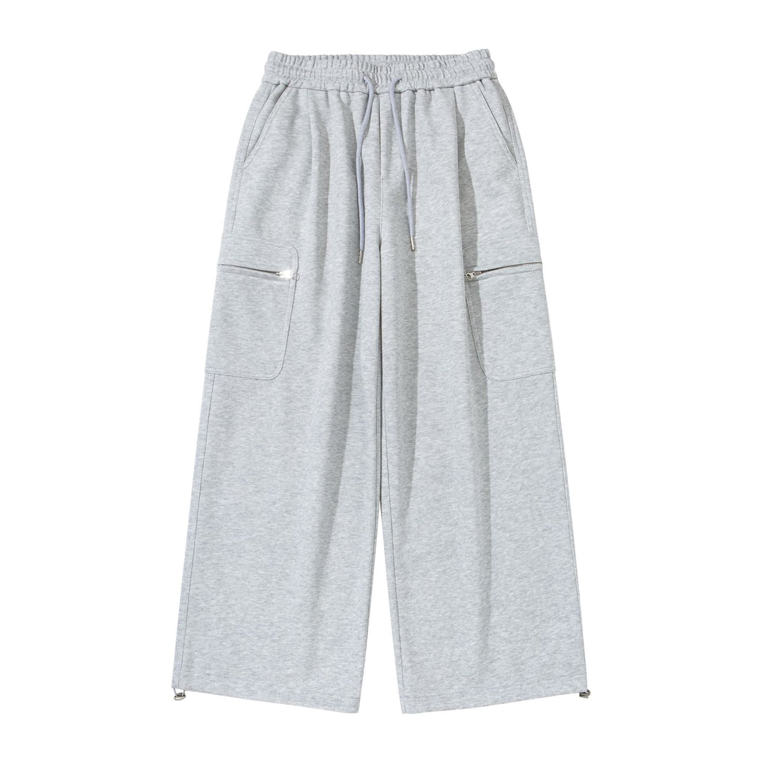 Damen Weite Cropped-Sweathose mit Tunnelzug, Cargo-Taschen und Reißverschluss-Details Drune