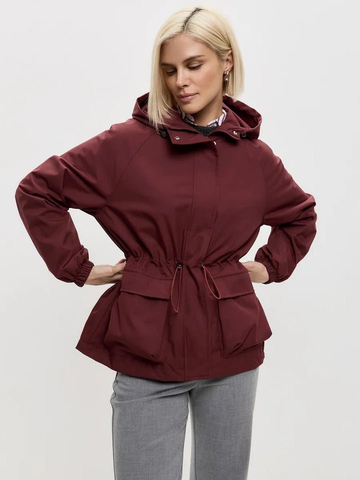 Damen wasserdichte Parka-Jacke mit Kapuze, Tunnelzugtaillierung und XXL-Klappentaschen Drune