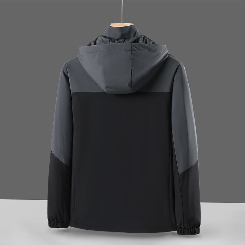 Herren Leichte Softshell-Windjacke mit Kapuze, wasserabweisender Membran und Reißverschlusstaschen Drune