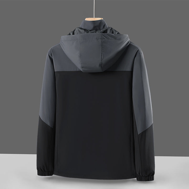 Herren Leichte Softshell-Windjacke mit Kapuze, wasserabweisender Membran und Reißverschlusstaschen Drune