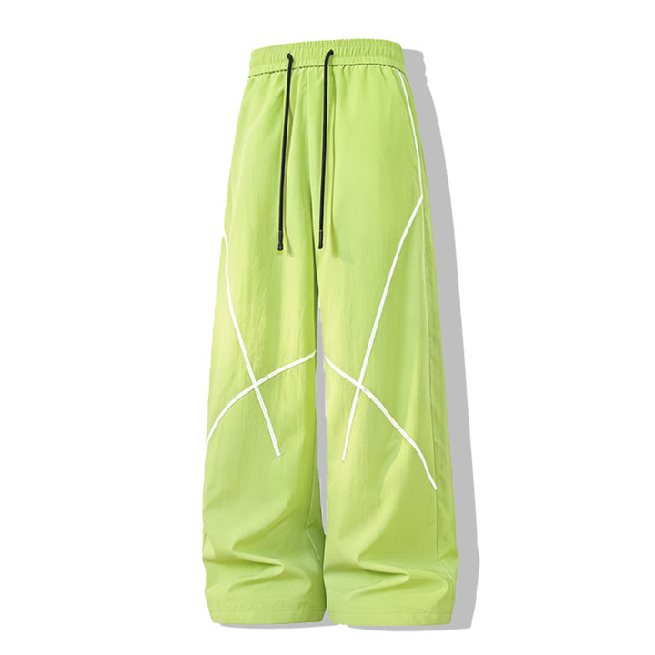 Herren Weite Funktions-Nylonhose mit Kordelbund, reflektierenden Nahtdetails & lässiger Baggy‑Silhouette Drune