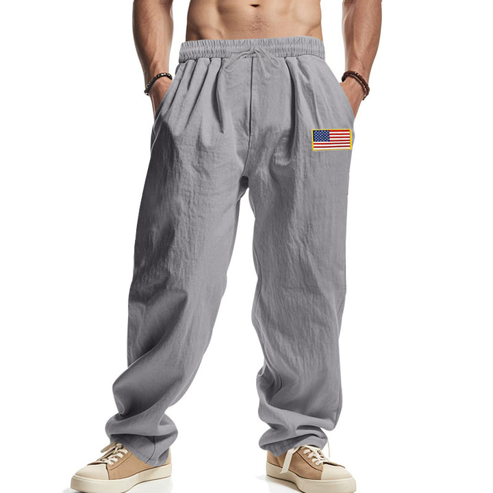 Herren Locker sitzende Freizeit-Hose im Leinen-Look mit elastischem Bund, Kordelzug & Flaggenpatch Drune