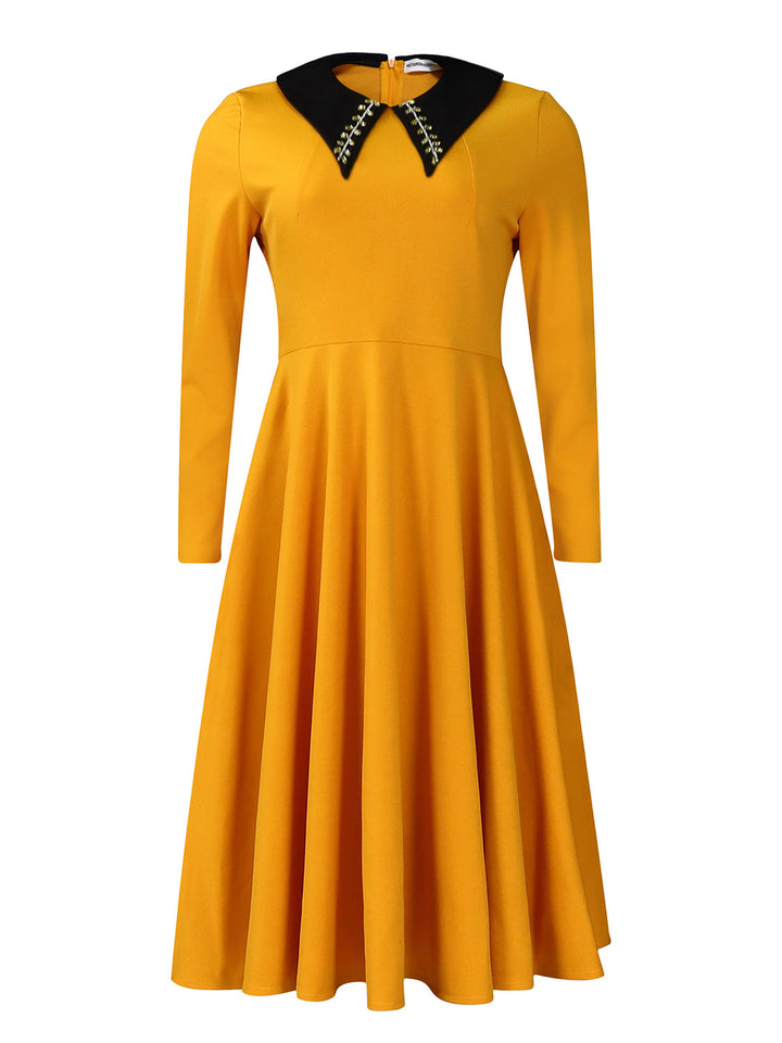 Damen Kleid mit elegantem Kragen und voluminösem Rock Drune