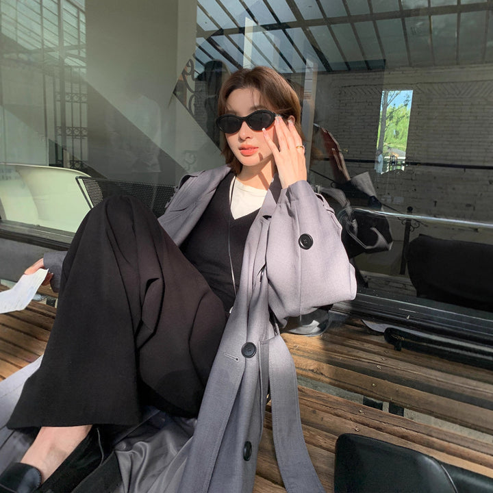 Damen Langer Trenchcoat im Oversize‑Look mit Bindegürtel und Schulterpatten Drune