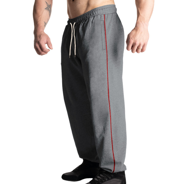 Herren nan weite Freizeit-Jogginghose mit elastischem Tunnelzugbund, dezentem Seitenstreifen und tiefen Eingrifftaschen Drune