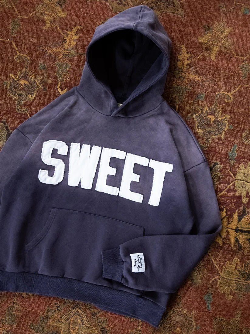 Unisex nan weit geschnittener Kapuzenpullover mit aufgesetzten Buchstabenapplikationen und Kängurutasche Drune