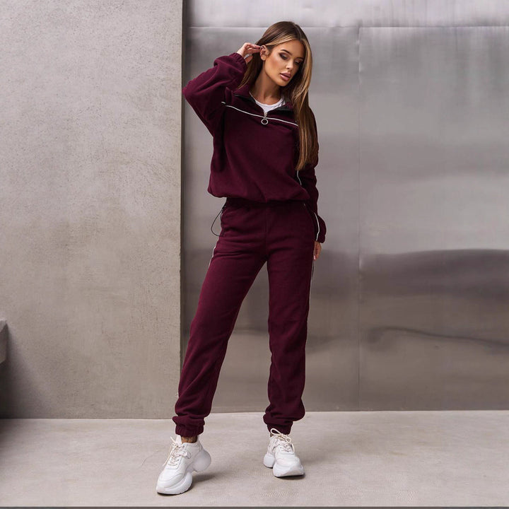 Damen Fleece-Sportanzug mit hohem Kragen und praktischen Reißverschlussdetails Drune