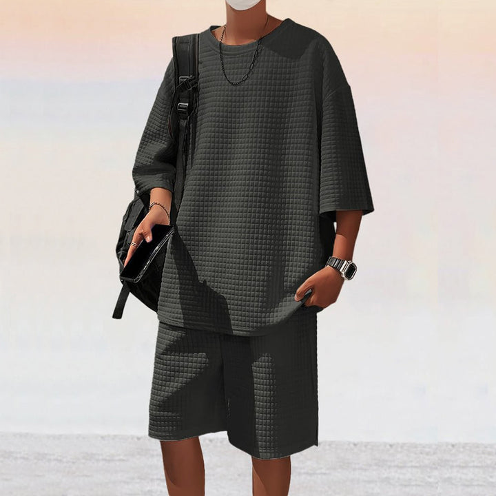 Herren nan quadratstruktur Freizeitset mit oversized Rundhalsshirt und knielangen Relax-Shorts Drune