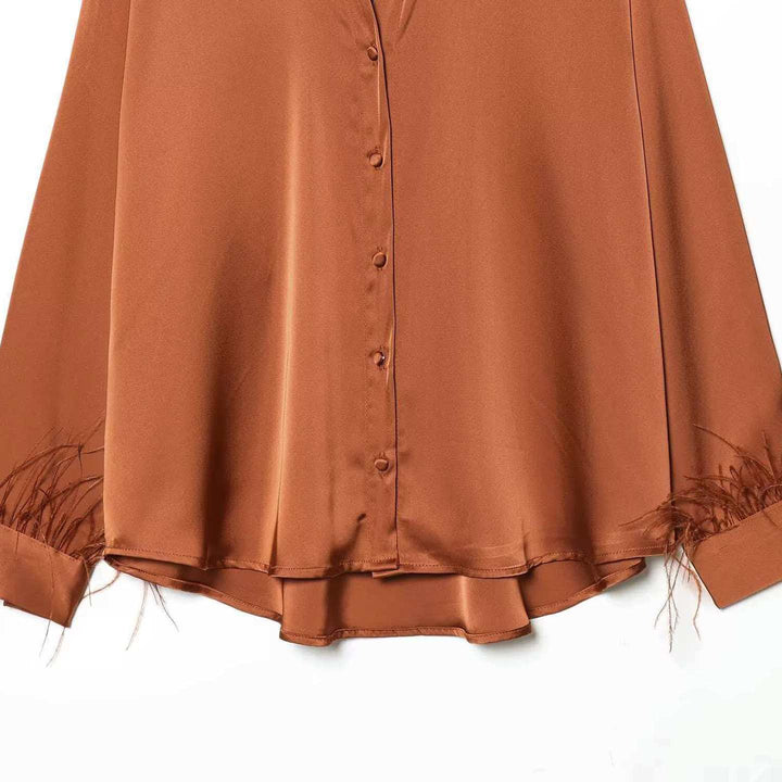 Damen Satinbluse mit eleganten Federverzierungen Drune