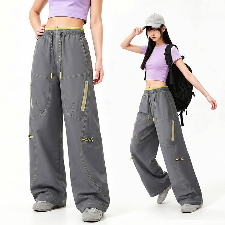 Damen Oversize Tech-Loungehose mit Kontrastnähten, reflektierenden Reißverschlusstaschen & Kordelbund Drune