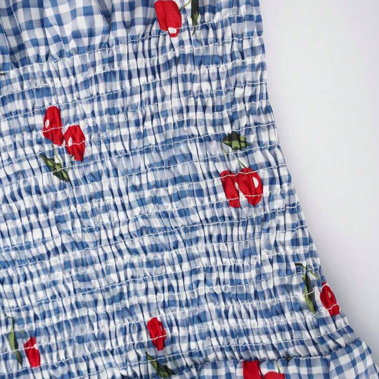 Damen Bluse mit floralem Karo-Muster und Rüschensaum Drune