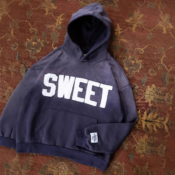 Unisex nan weit geschnittener Kapuzenpullover mit aufgesetzten Buchstabenapplikationen und Kängurutasche Drune