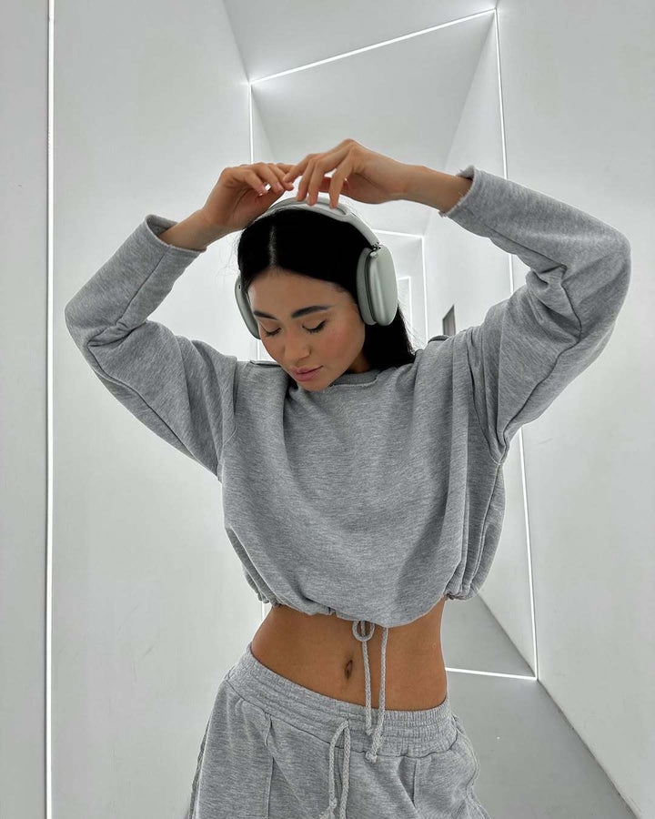 Damen kurzes Sweatshirt mit Kordelzug und Oversize-Ärmeln Drune