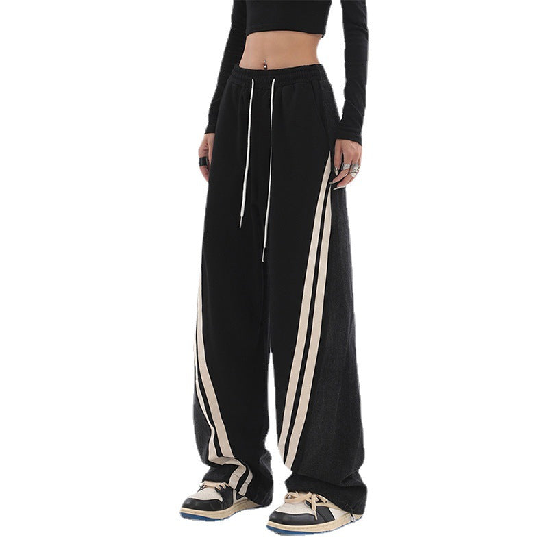 Damen nan weite Jogginghose mit hoher Taille und Jeansstoffeinsätzen sowie Seitenstreifen Drune