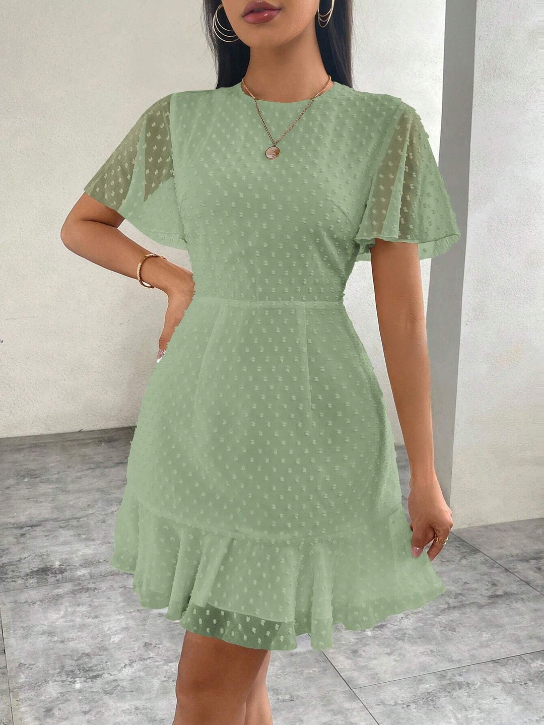 Drune | Dreidimensionales Kleid mit Rüschenrand und Punkten